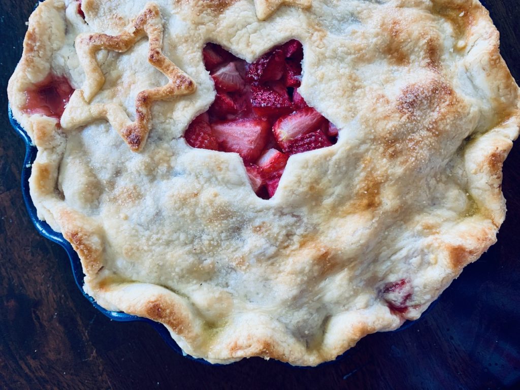 Strawberry Rhubarb Pie with a star cut-out.