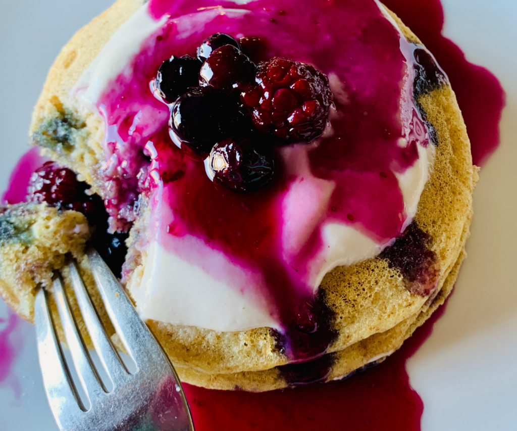 Pancakes with almond yogurt and blueberry syrup
